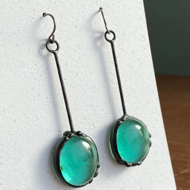 Coloured glaze electroplated metal earrings for women, silver colour, one pair shown on white background