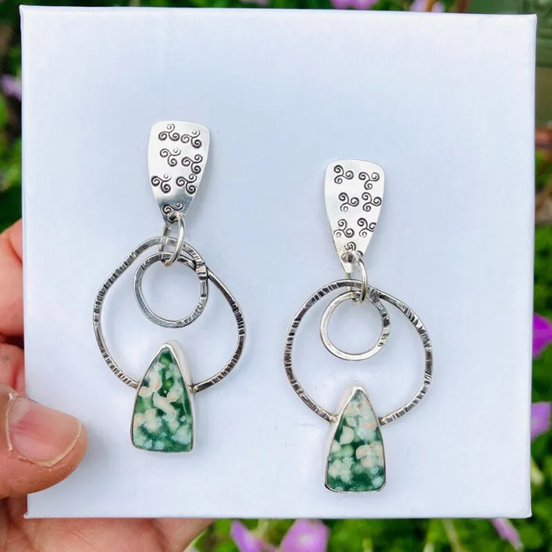 Coloured glaze electroplated metal earrings for women, silver colour, one pair shown on white background