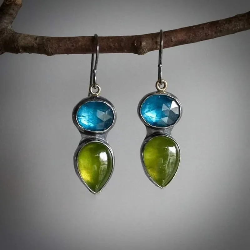 Coloured glaze electroplated metal earrings for women, silver colour, one pair shown on white background