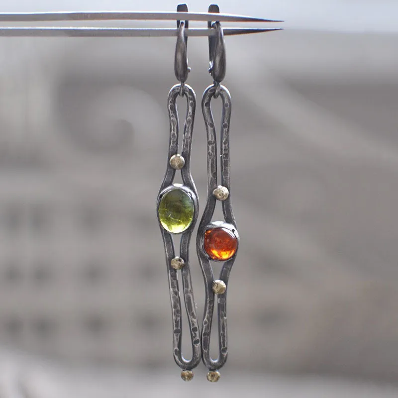 Coloured glaze electroplated metal earrings for women, silver colour, one pair shown on white background