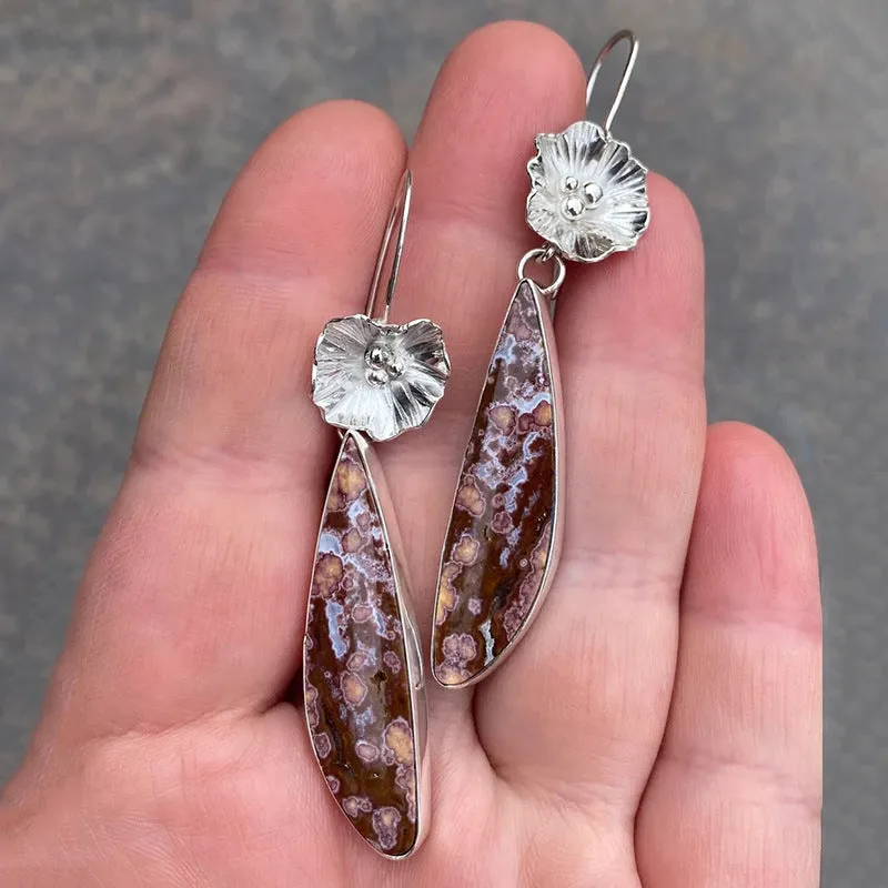 Coloured glaze electroplated metal earrings for women, silver colour, one pair shown on white background