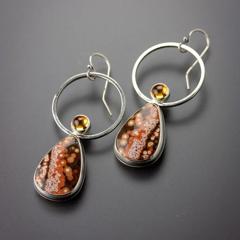 Coloured glaze electroplated metal earrings for women, silver colour, one pair shown on white background