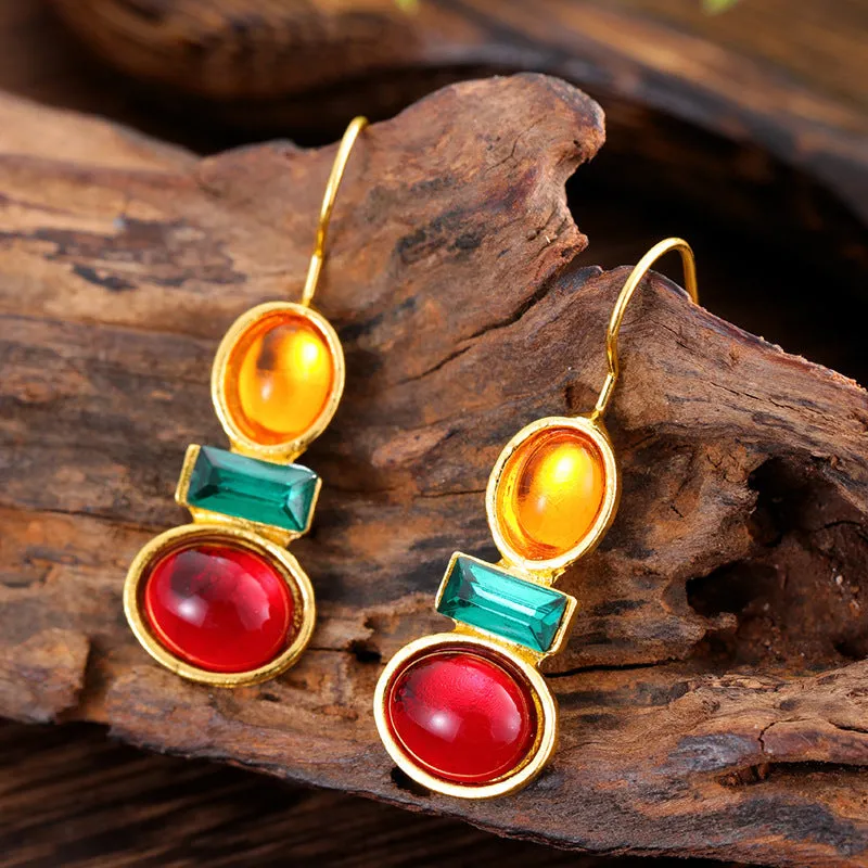 Coloured glaze electroplated metal earrings for women, silver colour, one pair shown on white background