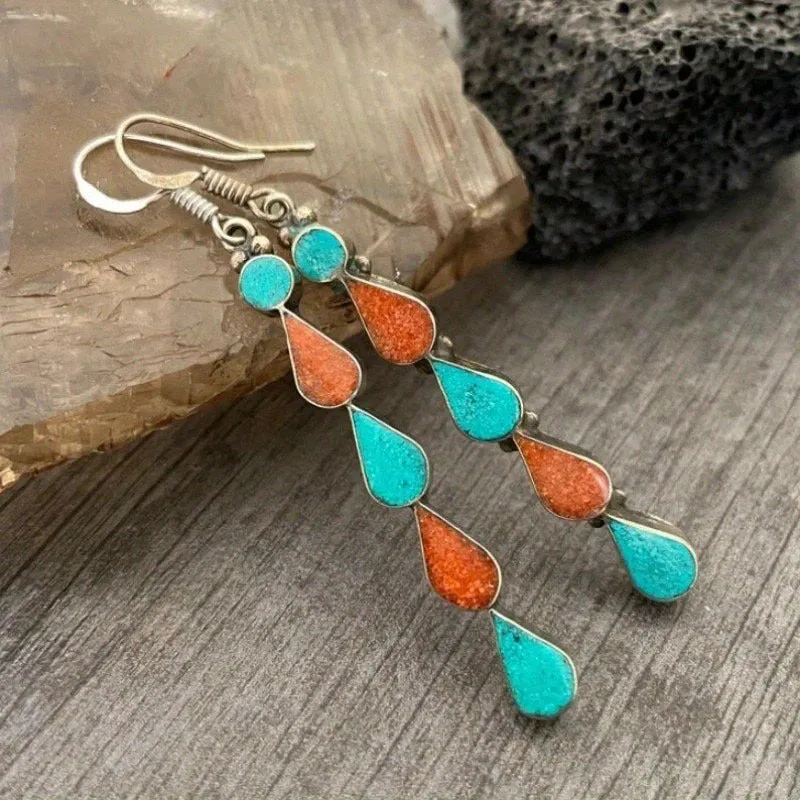 Coloured glaze electroplated metal earrings for women, silver colour, one pair shown on white background