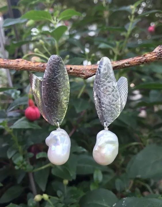 Coloured glaze electroplated metal earrings for women, silver colour, one pair shown on white background