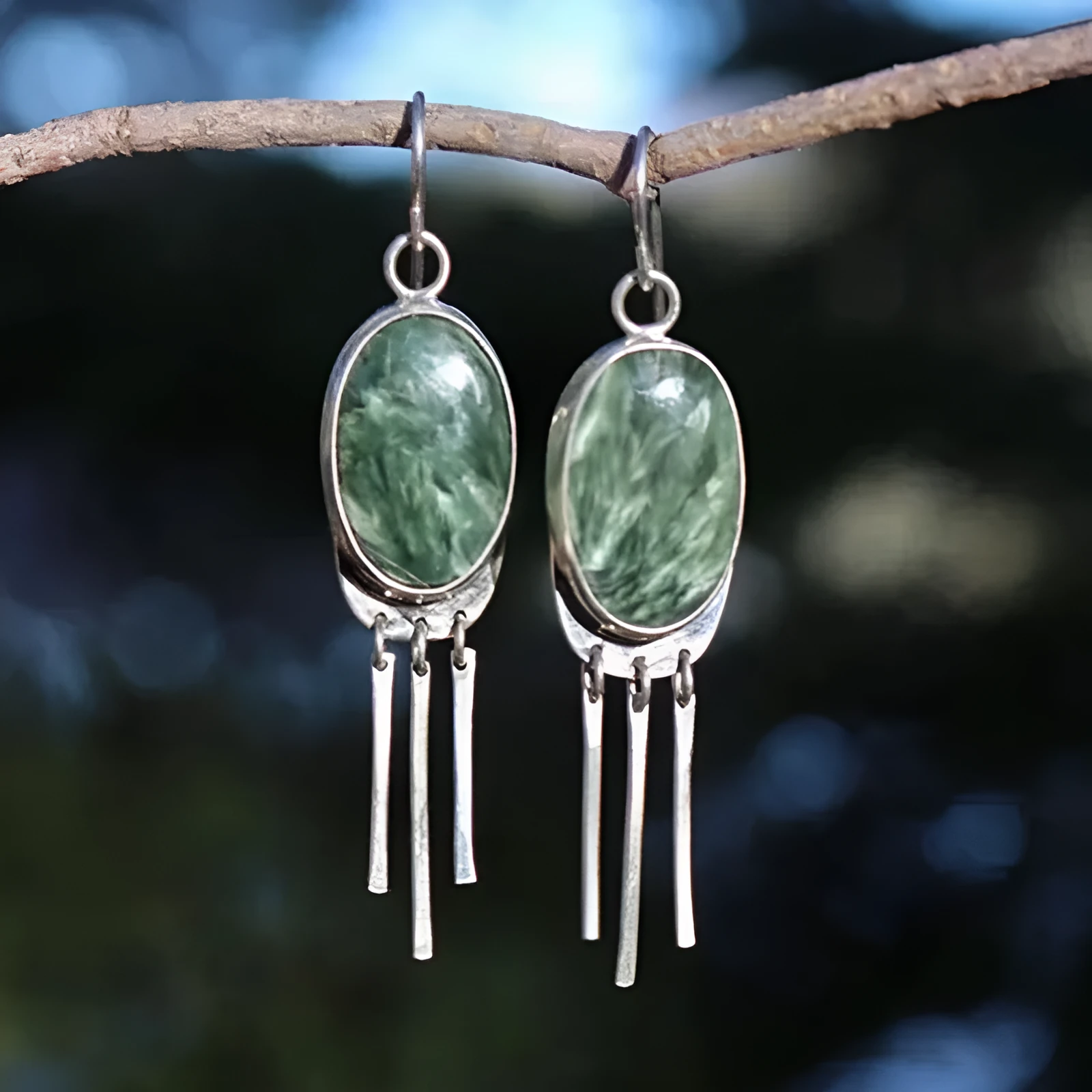 Coloured glaze electroplated metal earrings for women, silver colour, one pair shown on white background