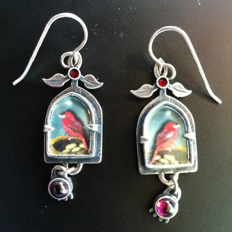 Coloured glaze electroplated metal earrings for women, silver colour, one pair shown on white background