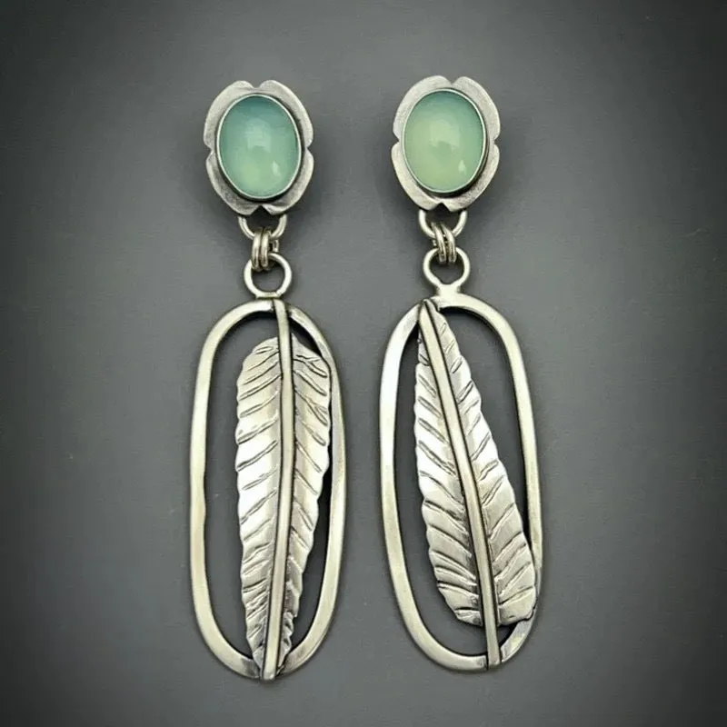 Coloured glaze electroplated metal earrings for women, silver colour, one pair shown on white background