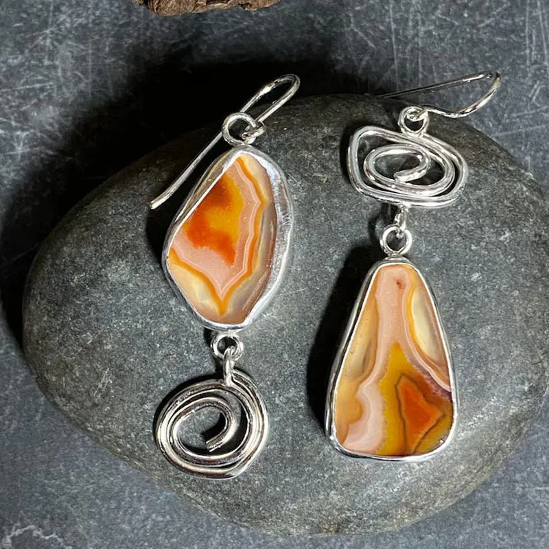 Coloured glaze electroplated metal earrings for women, silver colour, one pair shown on white background