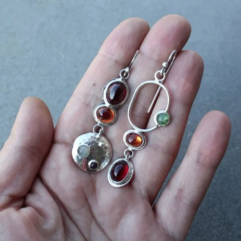 Coloured glaze electroplated metal earrings for women, silver colour, one pair shown on white background