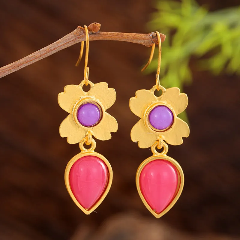Coloured glaze electroplated metal earrings for women, silver colour, one pair shown on white background