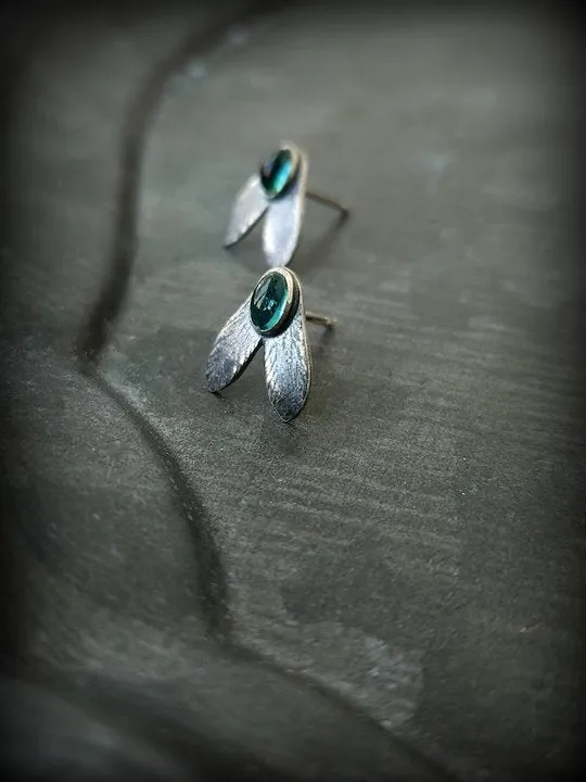 Coloured glaze electroplated metal earrings for women, silver colour, one pair shown on white background