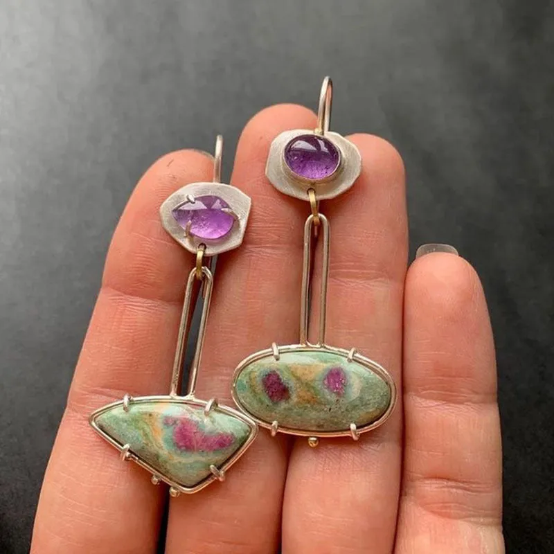 Coloured glaze electroplated metal earrings for women, silver colour, one pair shown on white background