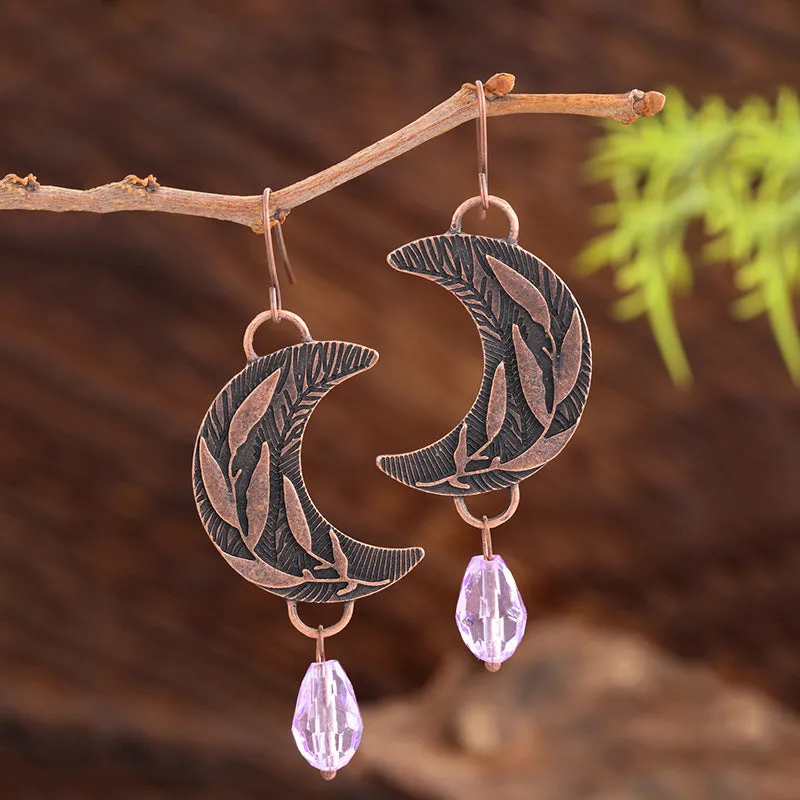 Coloured glaze electroplated metal earrings for women, silver colour, one pair shown on white background