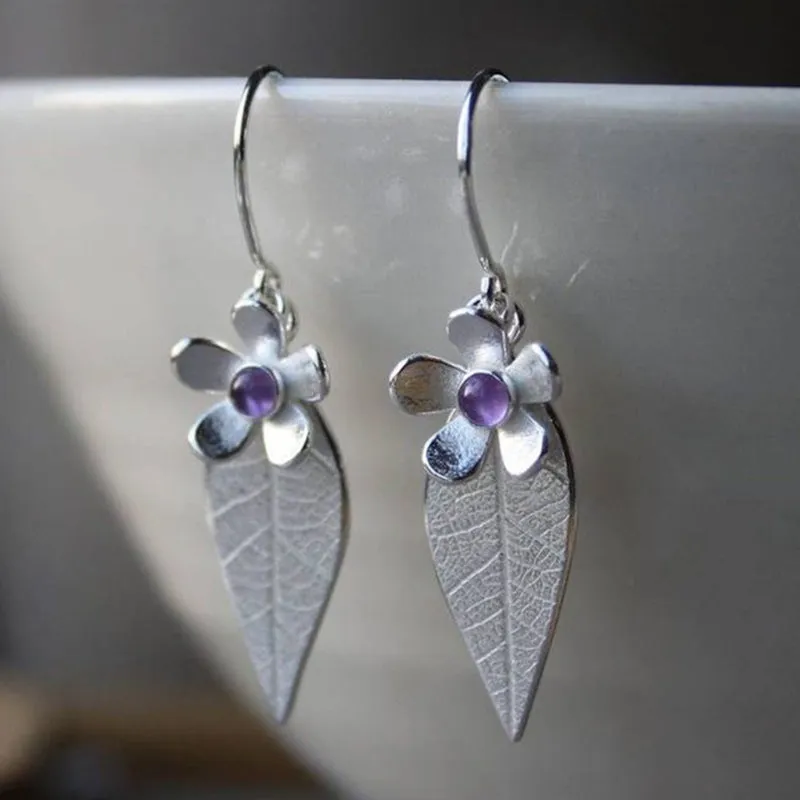Coloured glaze electroplated metal earrings for women, silver colour, one pair shown on white background