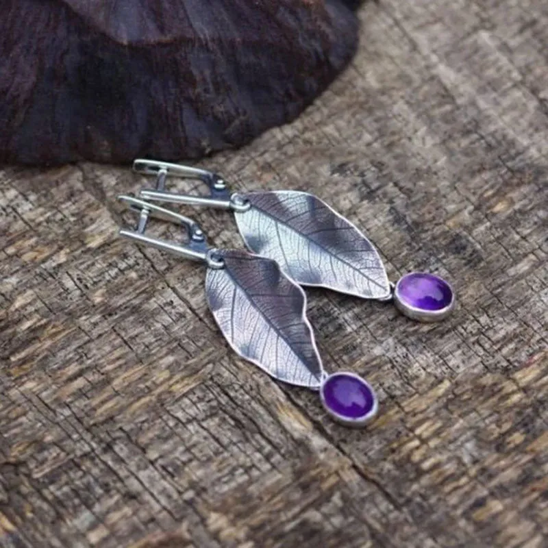 Coloured glaze electroplated metal earrings for women, silver colour, one pair shown on white background