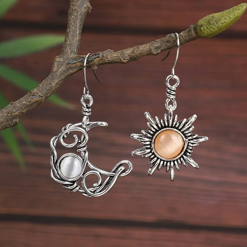 Coloured glaze electroplated metal earrings for women, silver colour, one pair shown on white background