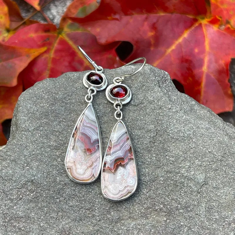 Coloured glaze electroplated metal earrings for women, silver colour, one pair shown on white background