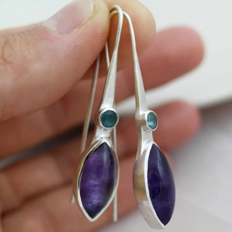 Coloured glaze electroplated metal earrings for women, silver colour, one pair shown on white background