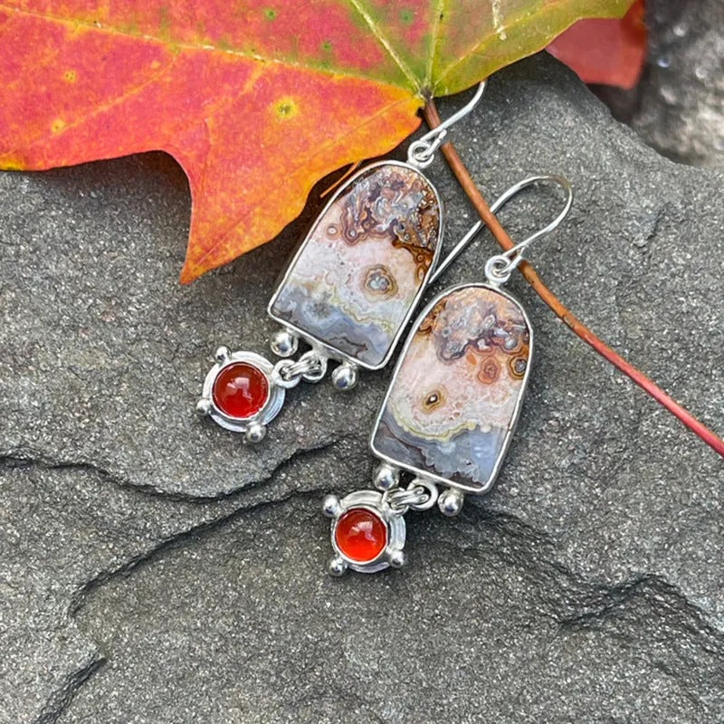Coloured glaze electroplated metal earrings for women, silver colour, one pair shown on white background
