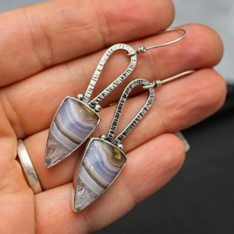 Coloured glaze electroplated metal earrings for women, silver colour, one pair shown on white background