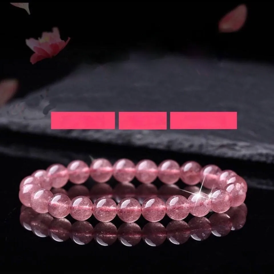 Women's strawberry quartz crystal bracelet with polished beads in 6mm, 8mm, or 10mm sizes.