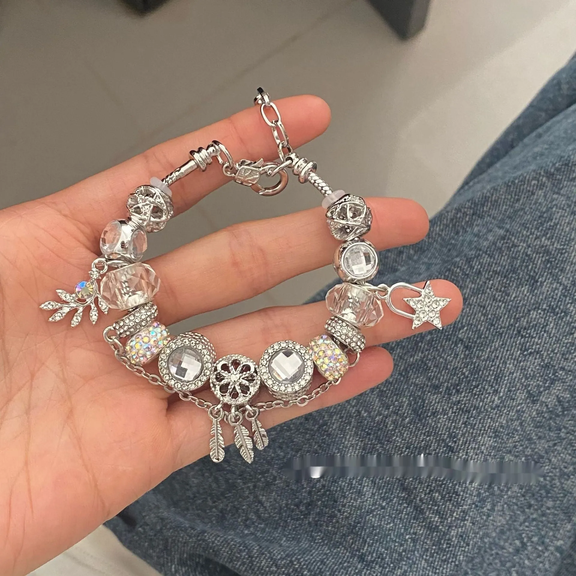 Women's dreamcatcher star bracelet with electroplated finish and colorful crystals