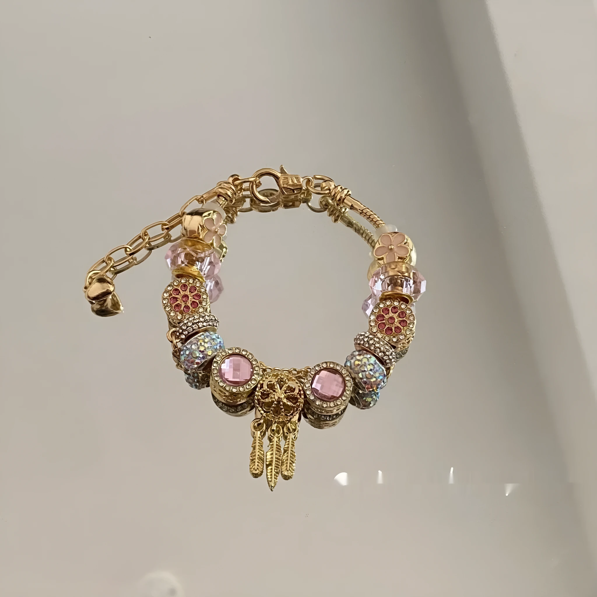 Women's dreamcatcher star bracelet with electroplated finish and colorful crystals