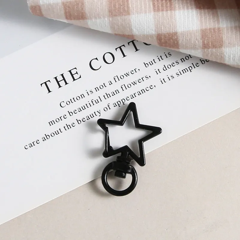 Metal five-pointed star snap button keychain with colour paint finish in alloy, small size, thirteen colour options including beige and sapphire blue