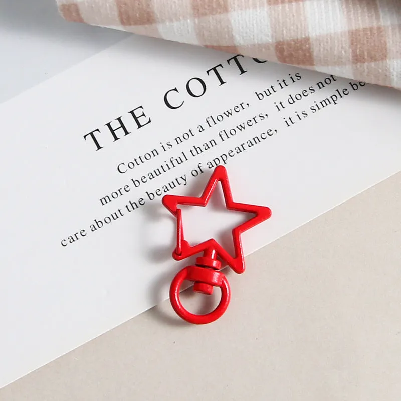 Metal five-pointed star snap button keychain with colour paint finish in alloy, small size, thirteen colour options including beige and sapphire blue