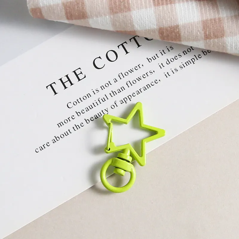 Metal five-pointed star snap button keychain with colour paint finish in alloy, small size, thirteen colour options including beige and sapphire blue