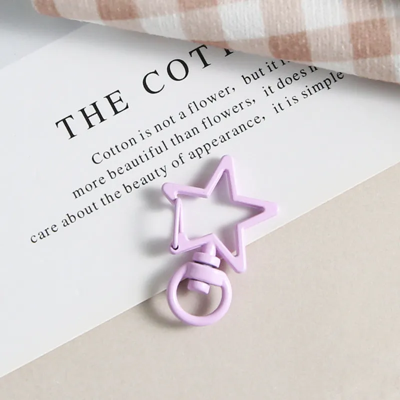 Metal five-pointed star snap button keychain with colour paint finish in alloy, small size, thirteen colour options including beige and sapphire blue