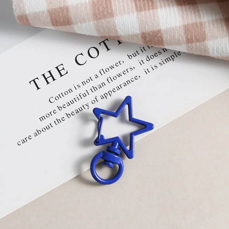 Metal five-pointed star snap button keychain with colour paint finish in alloy, small size, thirteen colour options including beige and sapphire blue