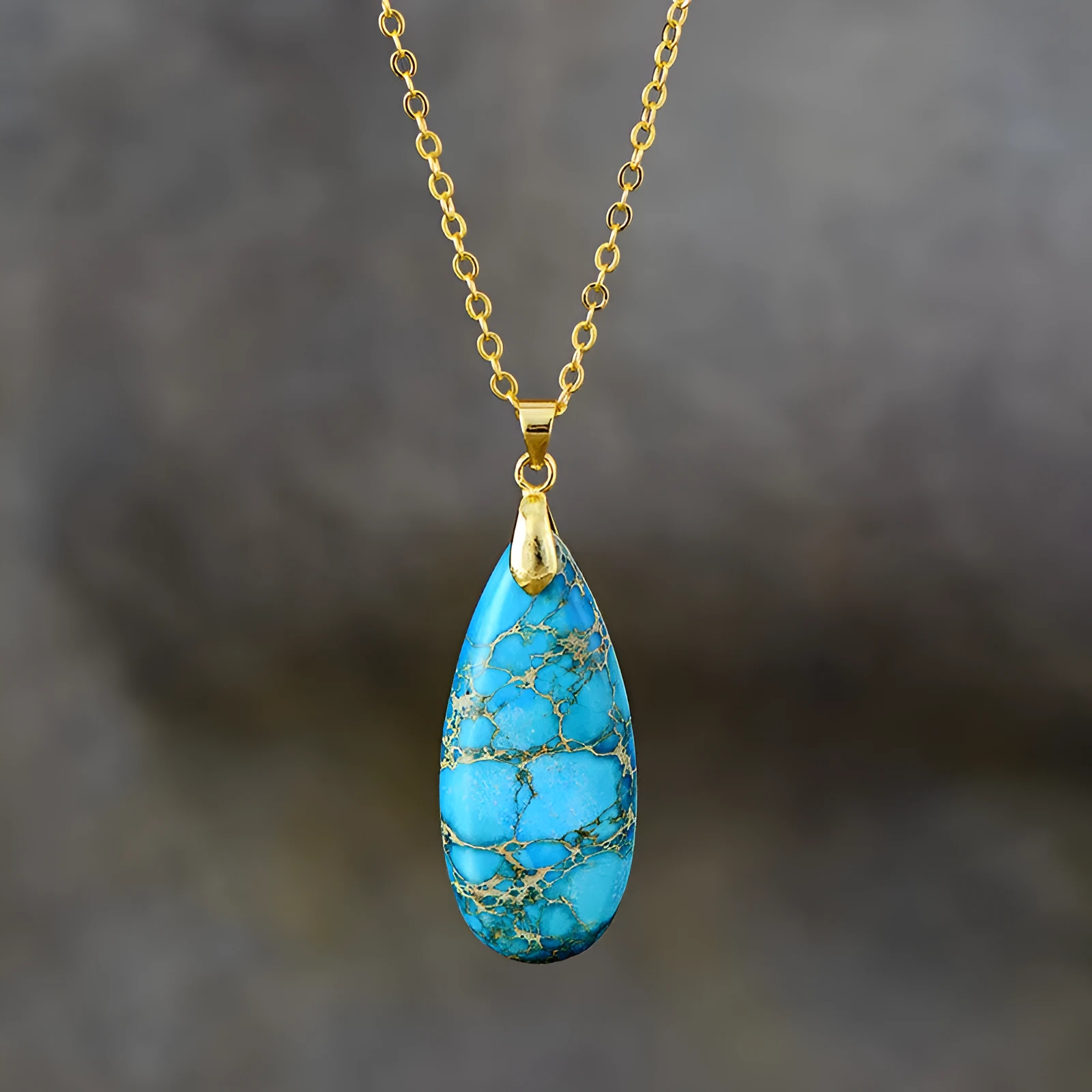 Emperor Stone genuine jade drop pendant on a thin gold-plated chain, showing four colour finish options.