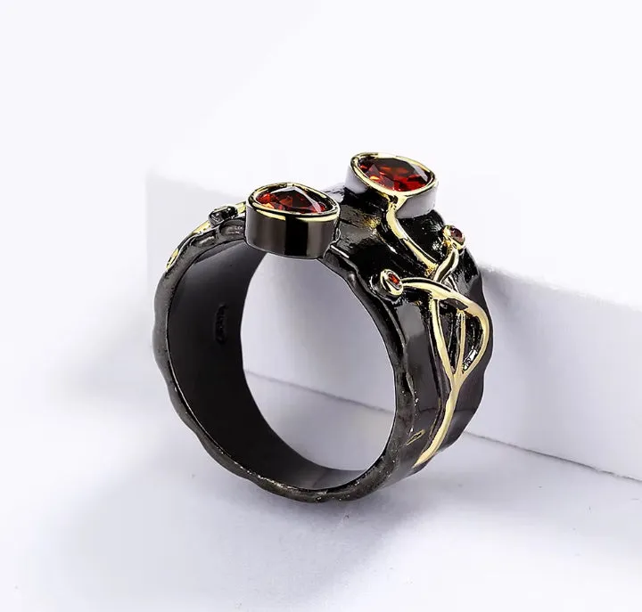 Retro women's brass oval ring in black finish on white background