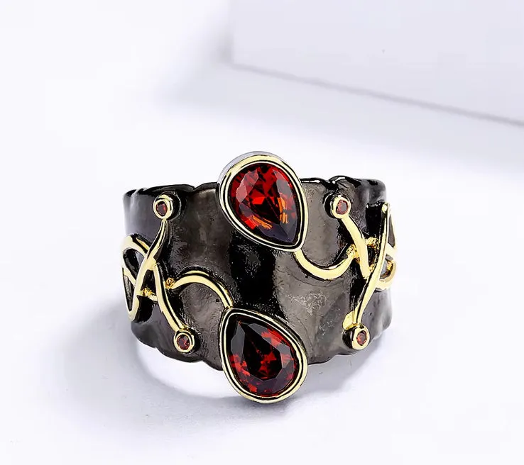 Retro women's brass oval ring in black finish on white background