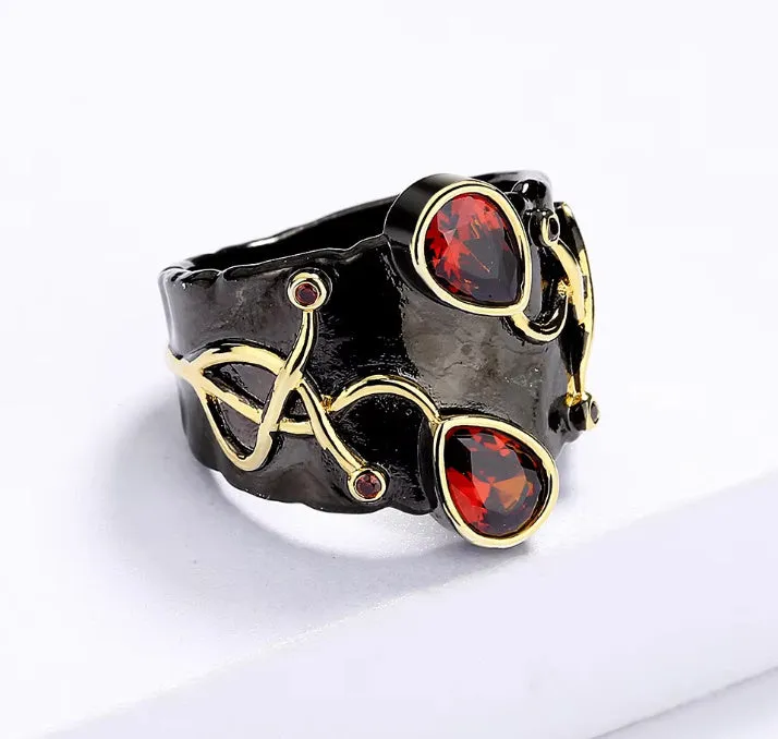 Retro women's brass oval ring in black finish on white background