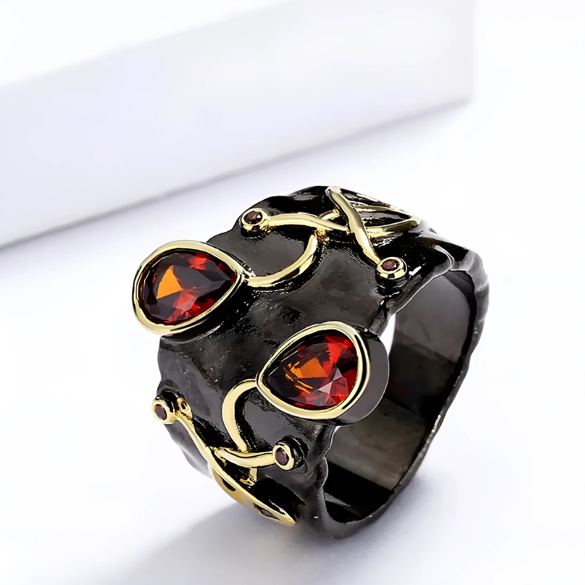 Retro women's brass oval ring in black finish on white background