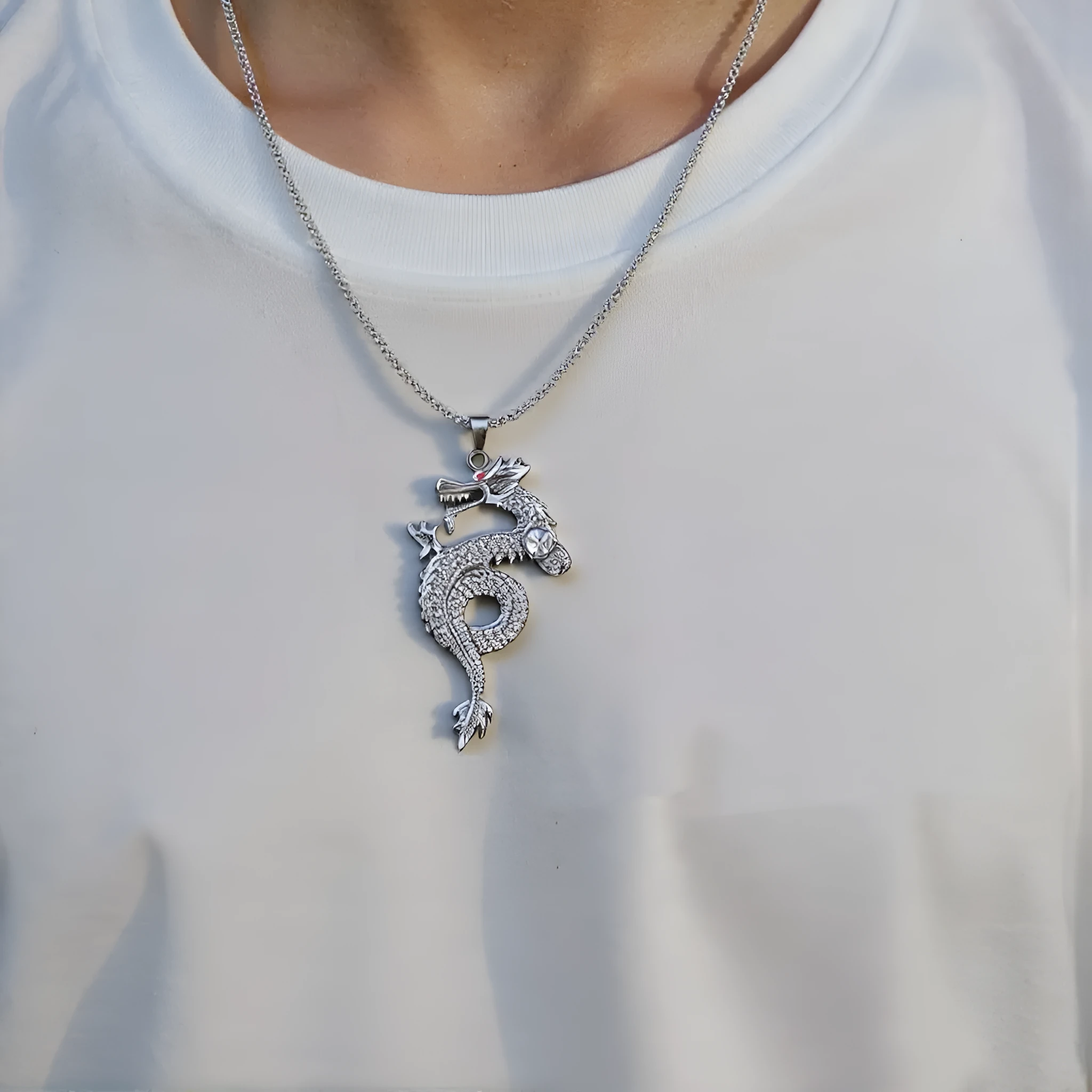 Silver alloy dragon-shaped pendant necklace with red eye detail and regular chain
