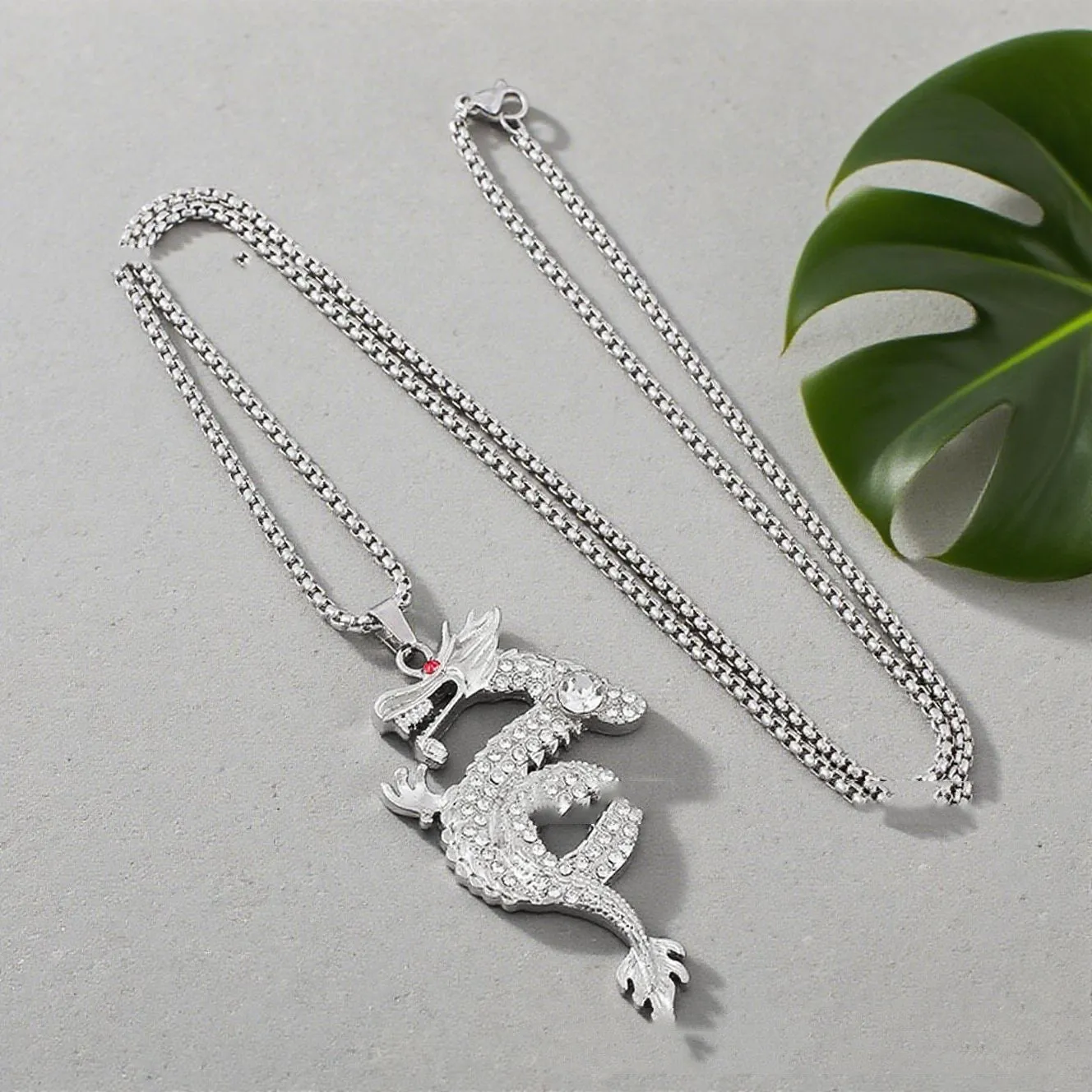 Silver alloy dragon-shaped pendant necklace with red eye detail and regular chain