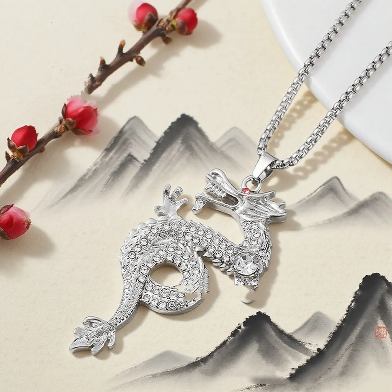 Silver alloy dragon-shaped pendant necklace with red eye detail and regular chain