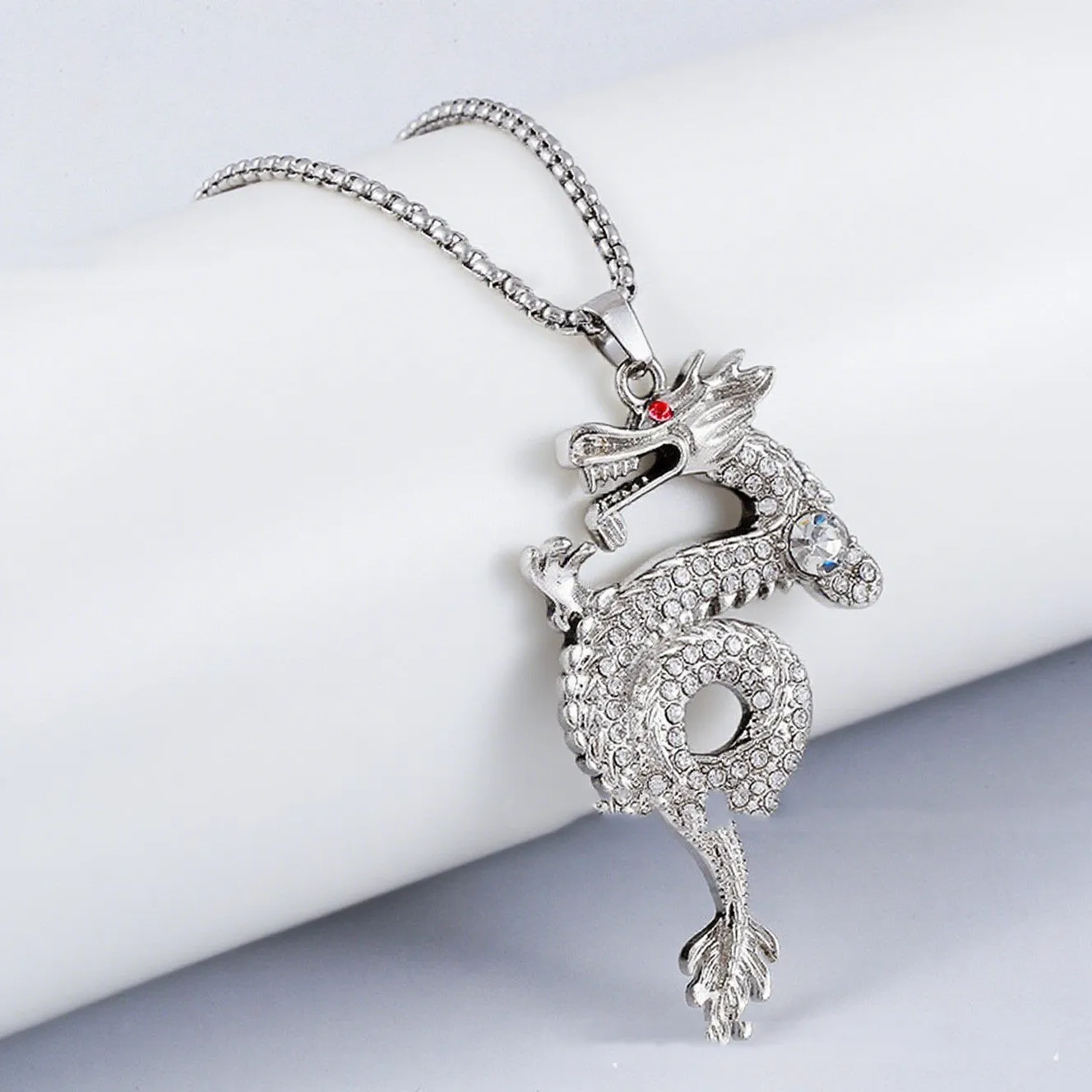 Silver alloy dragon-shaped pendant necklace with red eye detail and regular chain