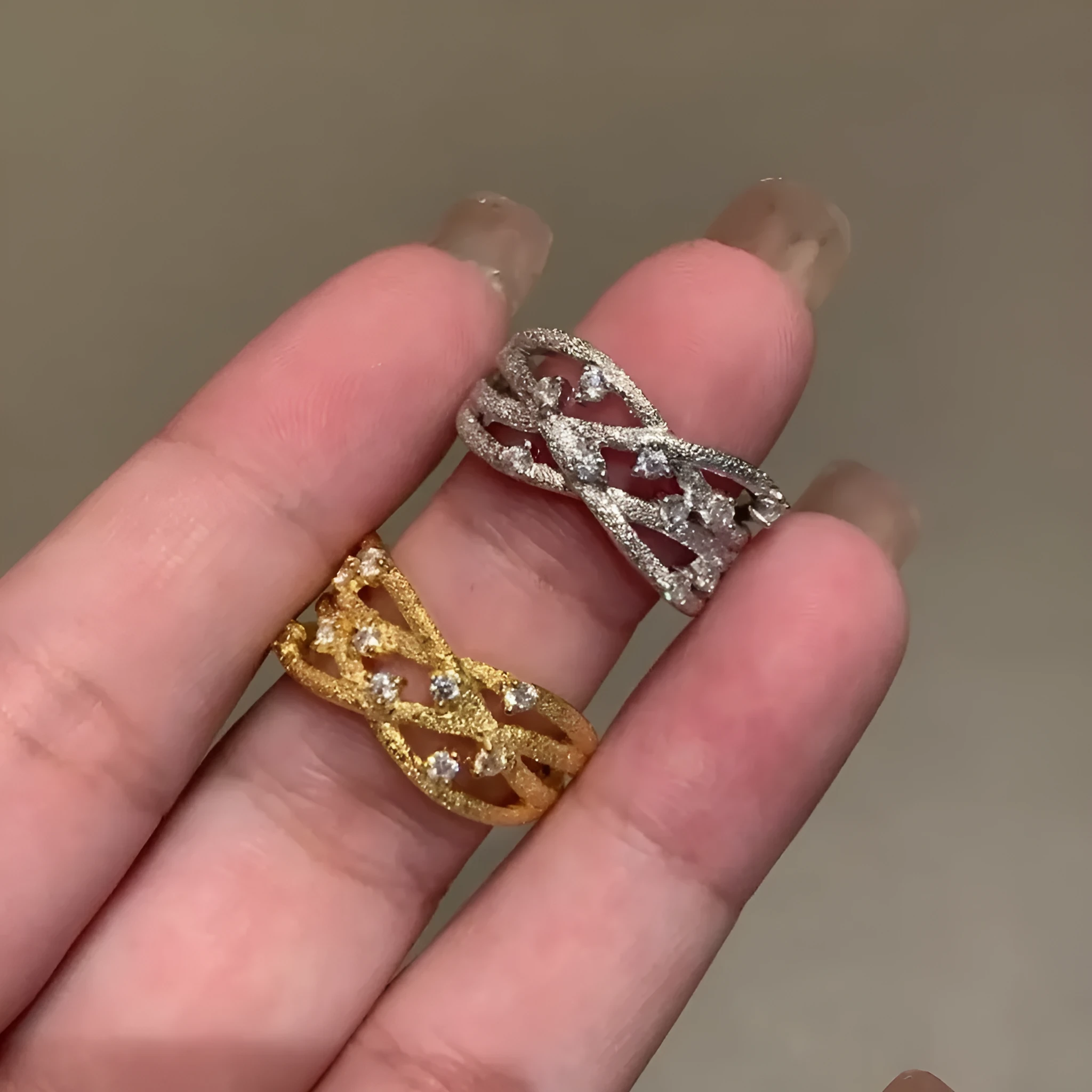 Women's adjustable copper ring with three-dimensional hollow vine cord design in gold electroplated finish