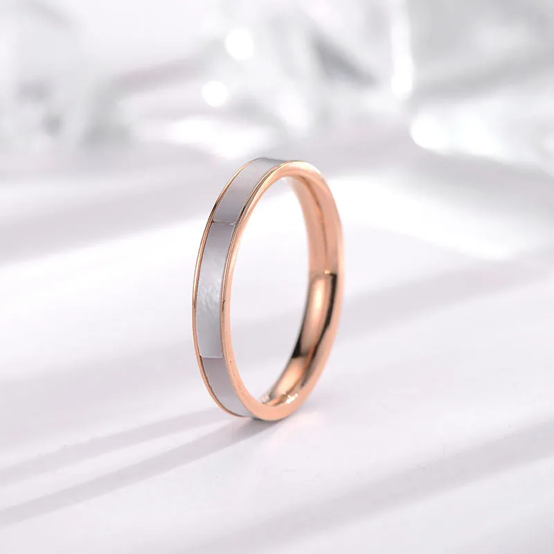 Titanium steel women's geometric ring with white shell inlay and electroplated finish