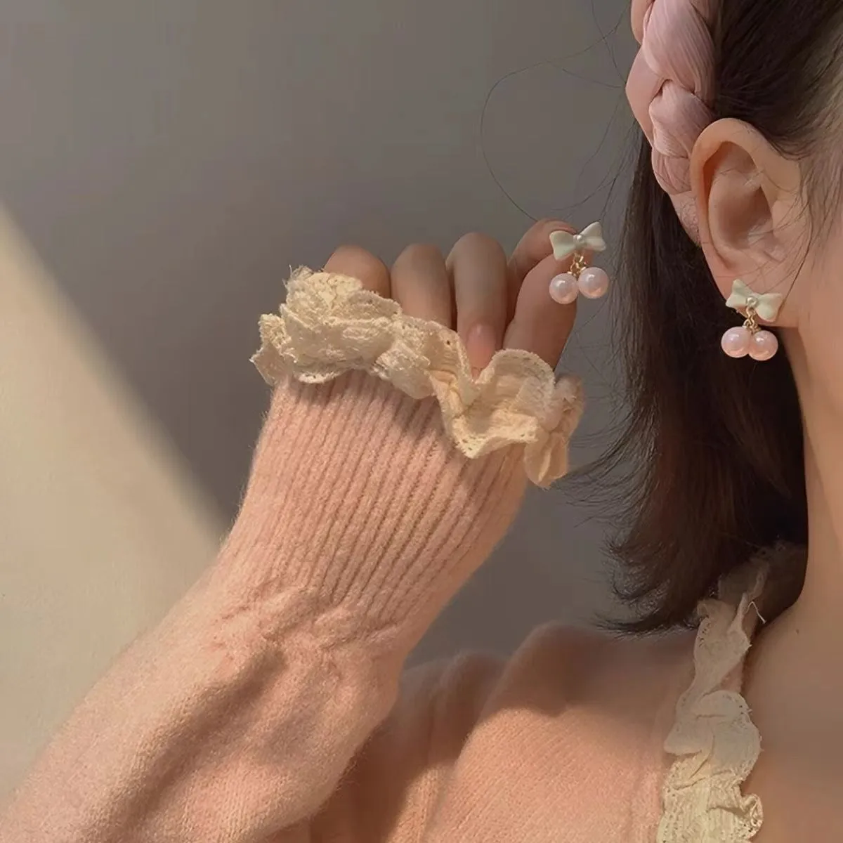 Pink heart pearl bow earrings on alloy with electroplated finish, silver needle style