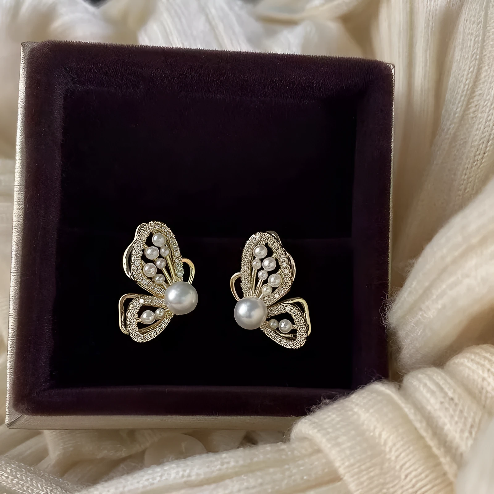 Copper butterfly pearl stud earrings with gold plating and zircon for women