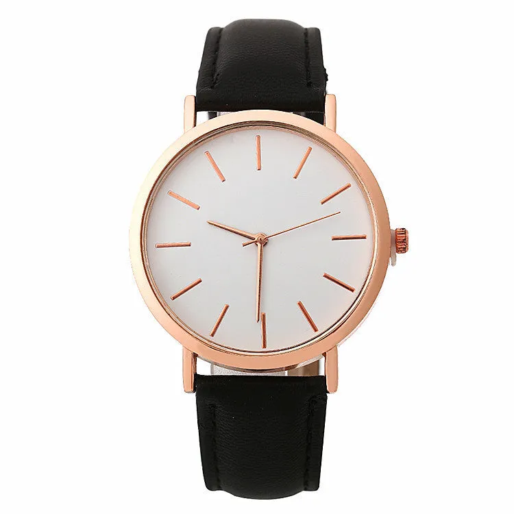 Women's quartz wristwatch round dial 28mm thin case beige strap on white background