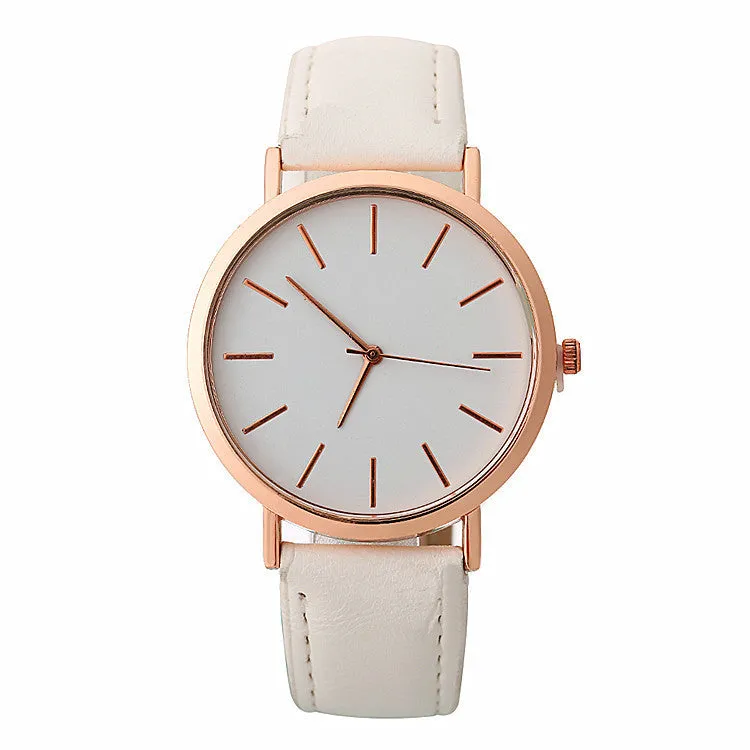 Women's quartz wristwatch round dial 28mm thin case beige strap on white background
