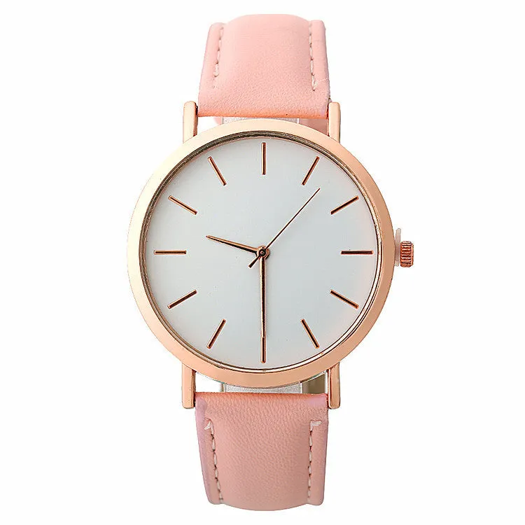 Women's quartz wristwatch round dial 28mm thin case beige strap on white background