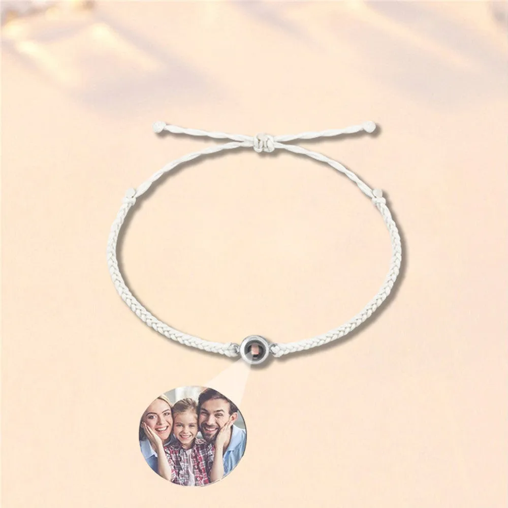 Handcrafted custom photo projection bracelet in silver with white rope, featuring alloy pendant with gold-plated inlaid artificial gemstones
